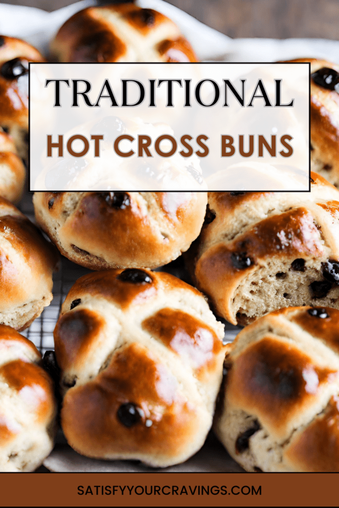 A tray of freshly baked hot cross buns, golden brown with white crosses on top, arranged neatly and surrounded by ingredients like flour, eggs, and spices.