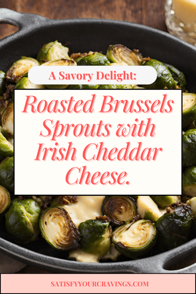 Roasted Brussels sprouts with melted Irish cheddar cheese on top, served on a white plate garnished with fresh herbs.