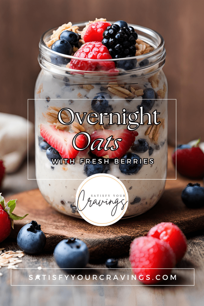 A jar of Overnight Oats with Fresh Berries, featuring layers of blueberries, raspberries, strawberries, and granola, perfect for a healthy and convenient breakfast. Visit satisfyyourcravings.com for the full recipe. #OvernightOats #HealthyBreakfast #BerryOvernightOats