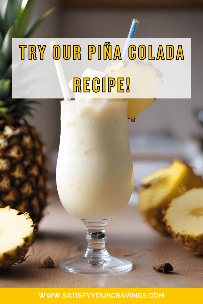 Try our Piña Colada recipe! A creamy and refreshing tropical cocktail garnished with a pineapple slice, displayed with fresh pineapples on a wooden table. Visit www.satisfyyourcravings.com for the full recipe.